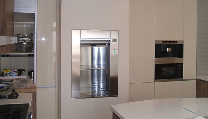 A dumbwaiter lift used in a home environment