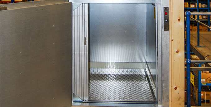 Interior of a trolley lift used in a warehouse environment